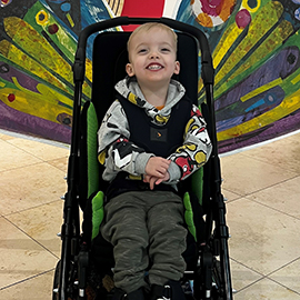 Felix in his pushchair